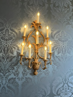A chandelier attached to a wall