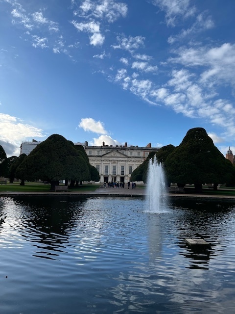 Hampton Court Palace as seen across a pond
