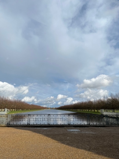Photo of Hampton Court palace gardens featuring iron gates